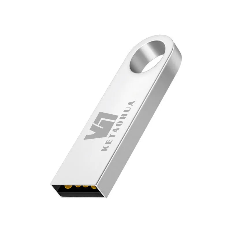 Custom silver metal car-shaped USB flash drive on a white background