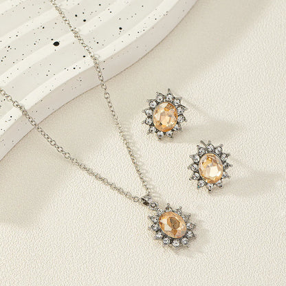 Sunflower zircon necklace and earring set in alloy with electroplated finish showing ellipse-shaped design
