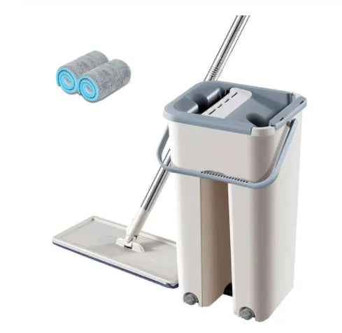 Blue flat floor mop with rotating head and microfiber pad beside plastic bucket for floor cleaning