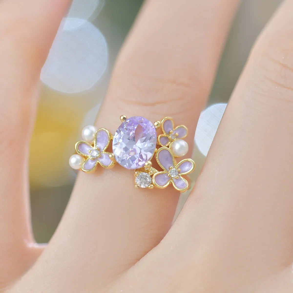 Women's adjustable open ring with flower and pearl design in yellow or light purple electroplated metal