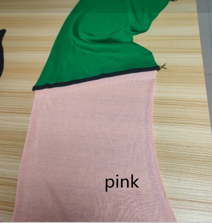 Stylish two-piece knit jumpsuit in a variety of vibrant colors, featuring a split-front top and comfortable shorts