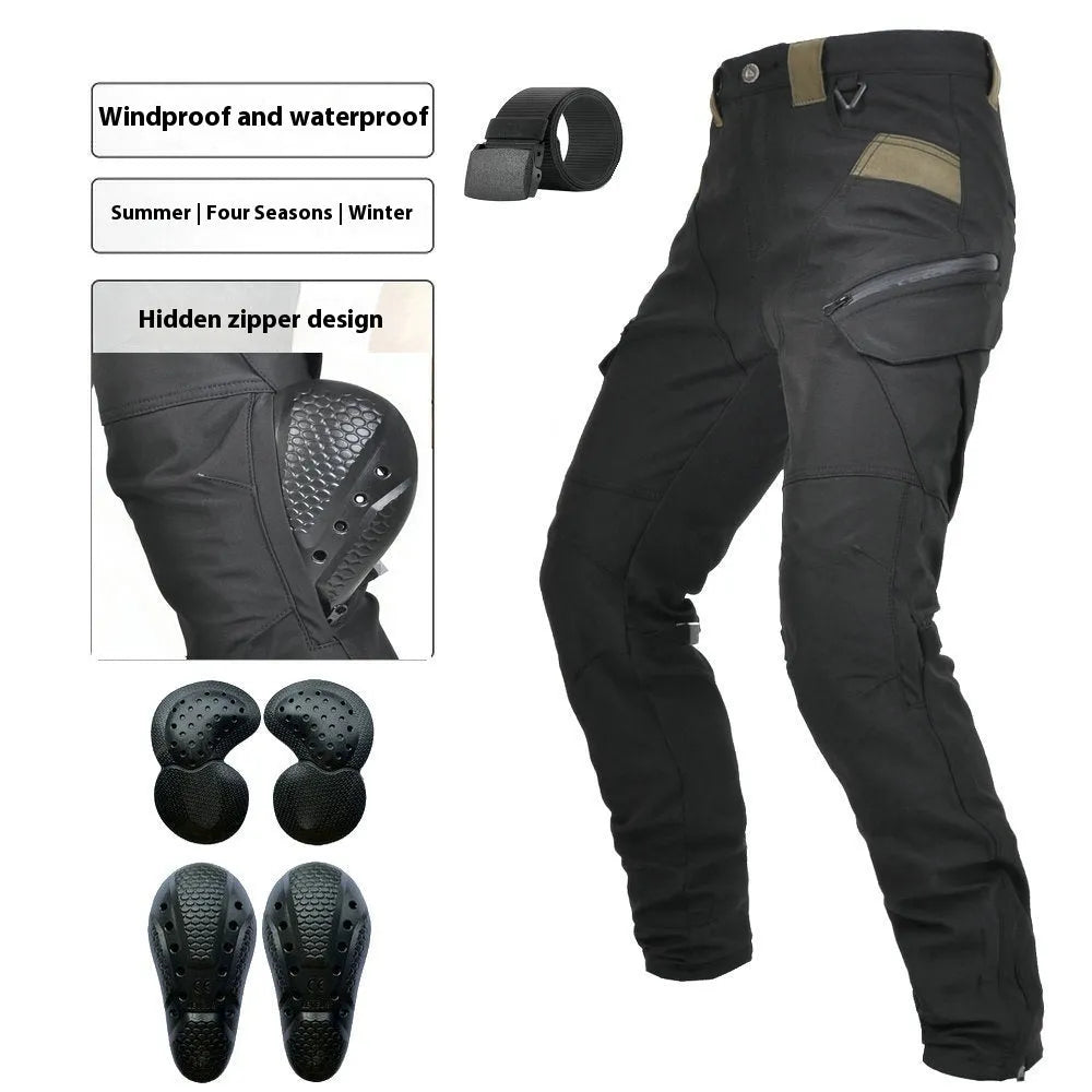 Motorcycle rider wearing green waterproof trousers with removable protective armour on knees and hips.