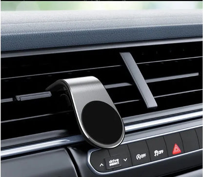 Black, gold, and silver car mounting bracket for dashboard or windscreen, shown with adhesive sticker and rotating variants.