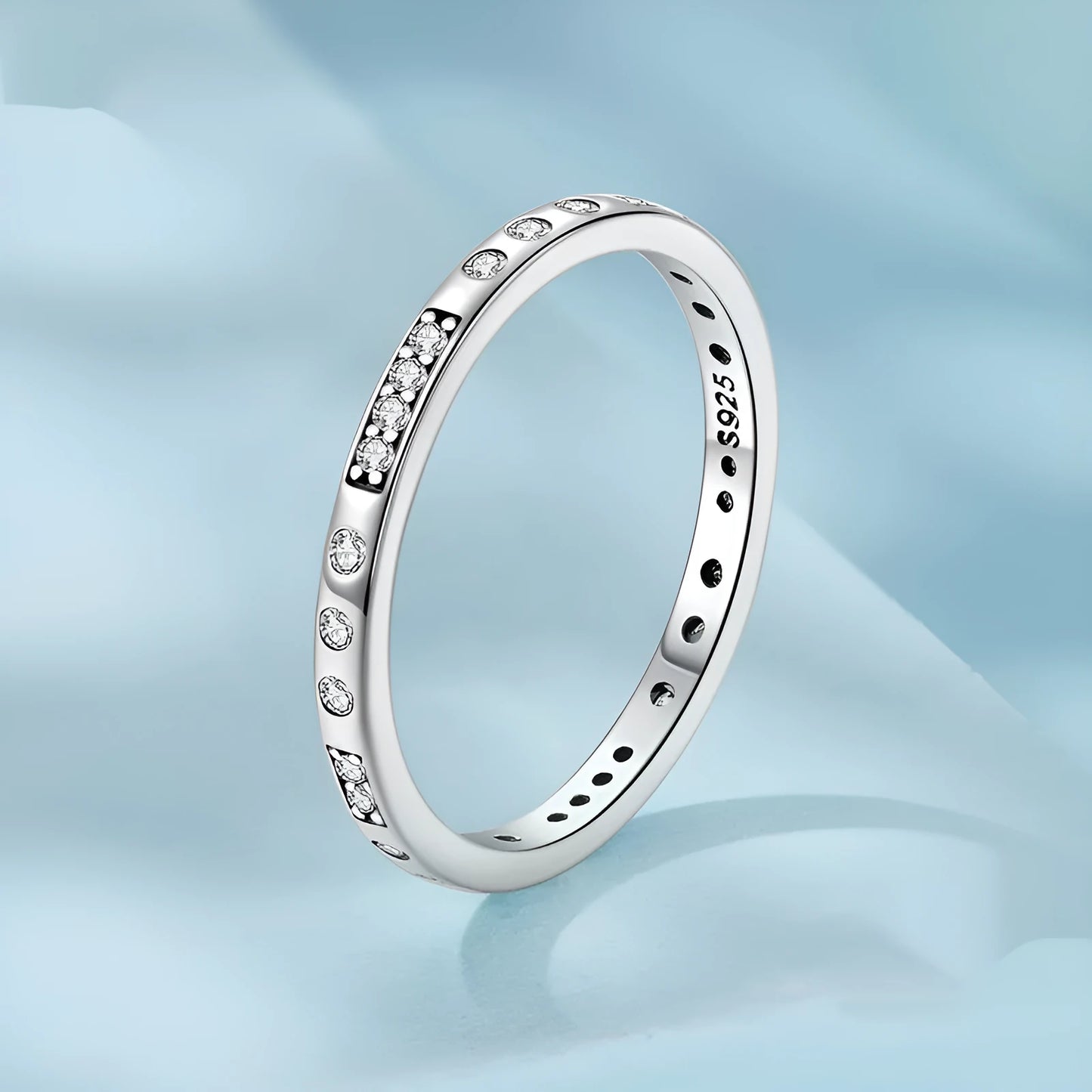 Silver alloy Moss Password I Love You ring with oxidised black finish, shown in size 7 on a model finger.