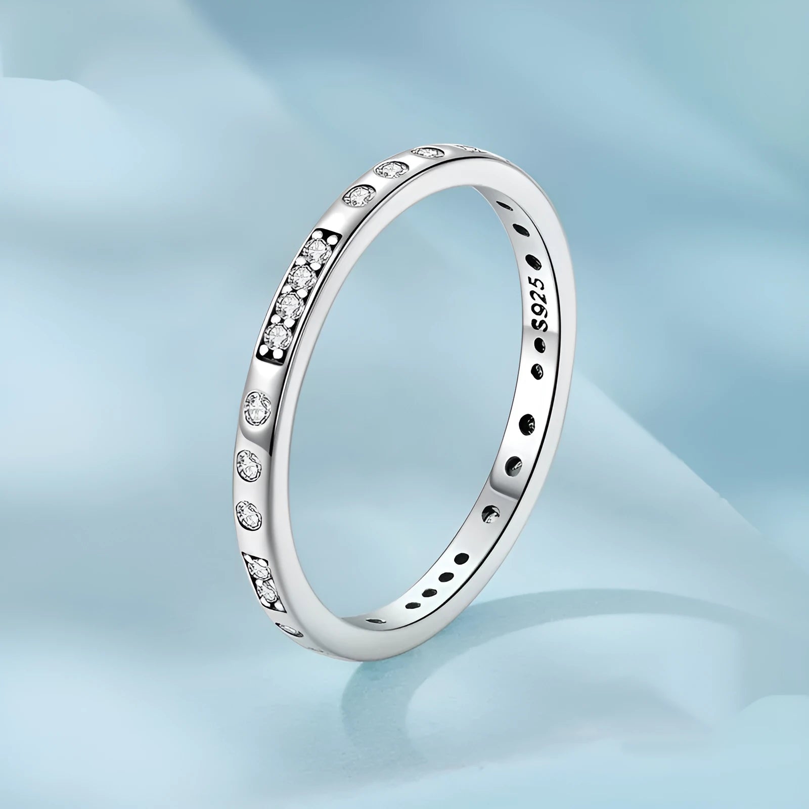 Silver alloy Moss Password I Love You ring with oxidised black finish, shown in size 7 on a model finger.