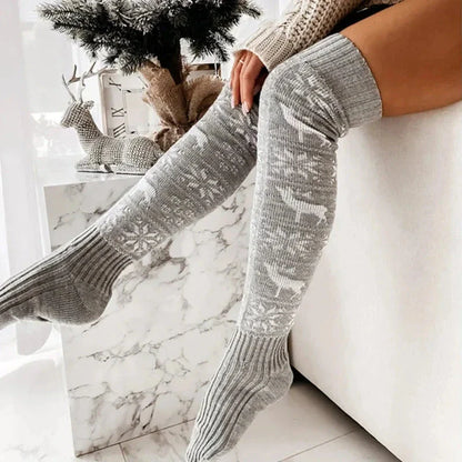 Cozy Christmas knee-high socks with festive elk and snowflake patterns