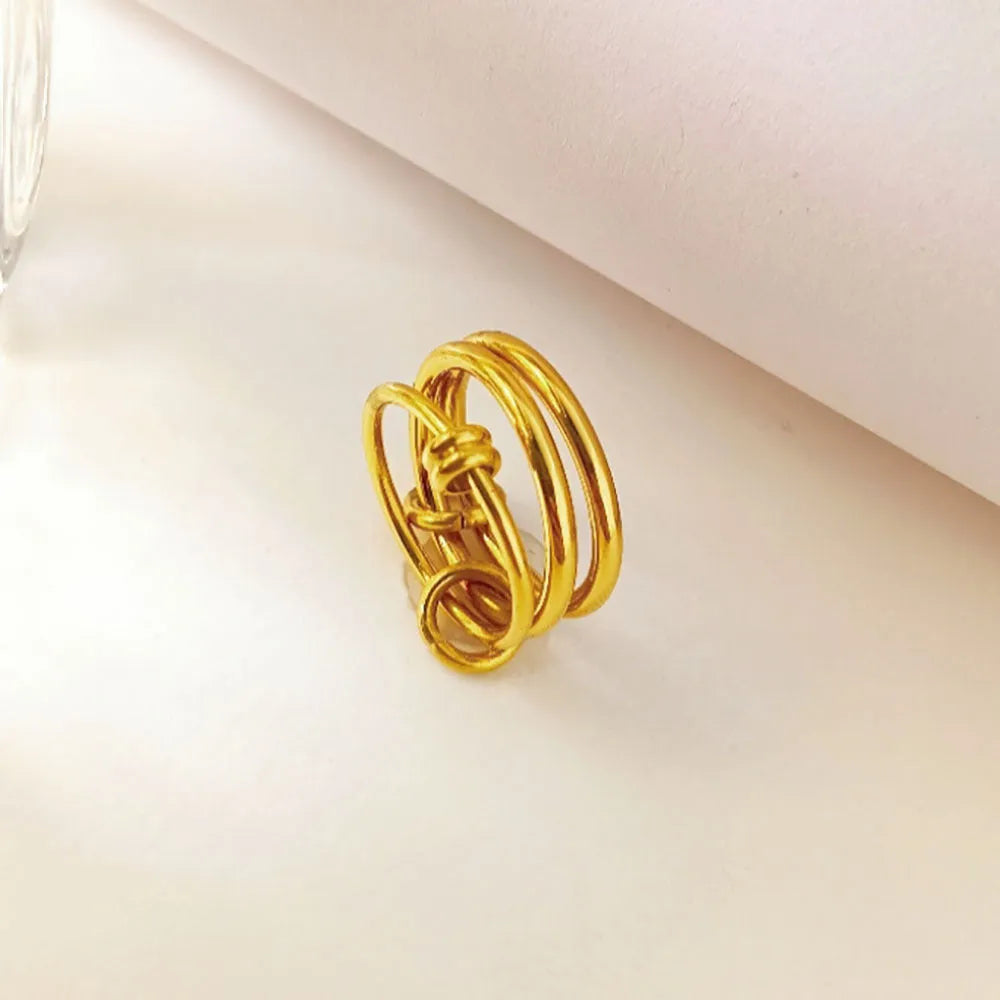 Gold electroplated titanium steel ring with geometric line design in Trinity ring gold B398, sizes 6 to 8