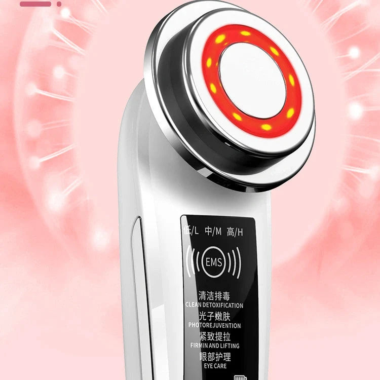 Pink and white facial massager with light therapy and pore cleansing features