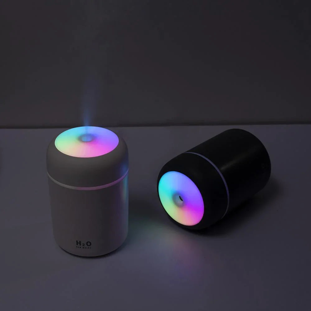 Compact and quiet bedroom humidifier with soothing colour-changing lights for a relaxing sleep environment