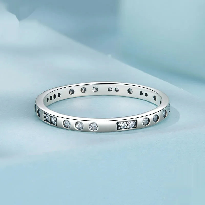 Silver alloy Moss Password I Love You ring with oxidised black finish, shown in size 7 on a model finger.