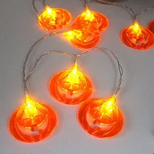 Halloween LED string lights with bat, ghost, and pumpkin pendants on a 1.2 metre white cable.