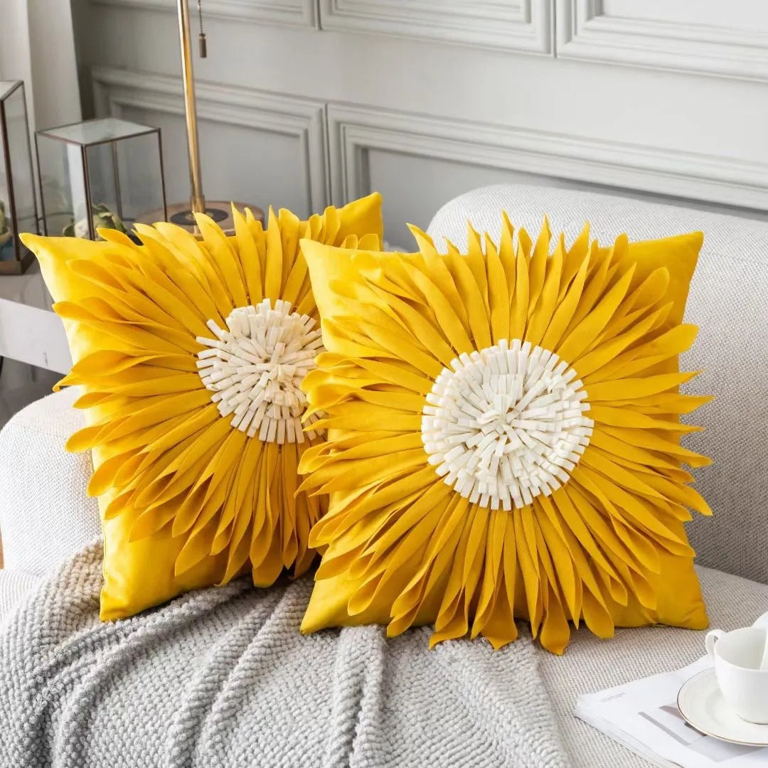 Blue velvet waist pillow with three-dimensional white chrysanthemum tufted design and fringed hem