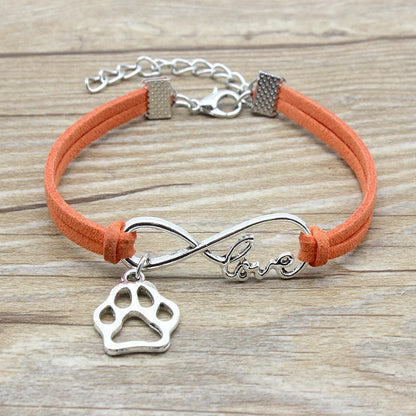 Stylish hand-woven infinite love pet bracelet in various colours, featuring a bow design and made of premium alloy materials