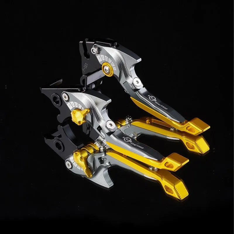 Pair of anodised metal bicycle brake horn handle levers with adjustable reach, shown in a two-tone colour finish.