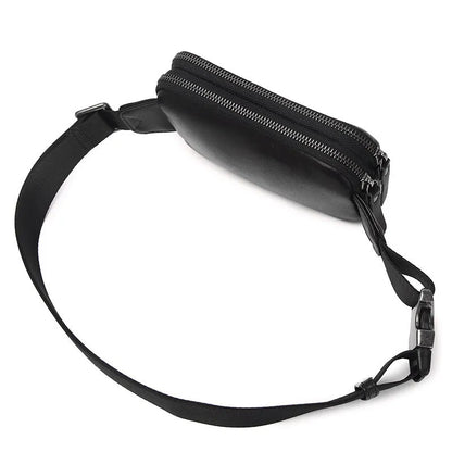 Men's small leather crossbody bag in black showing compact dimensions and crossbody strap