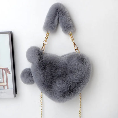 Plush heart-shaped women's handbag in medium size with removable shoulder strap