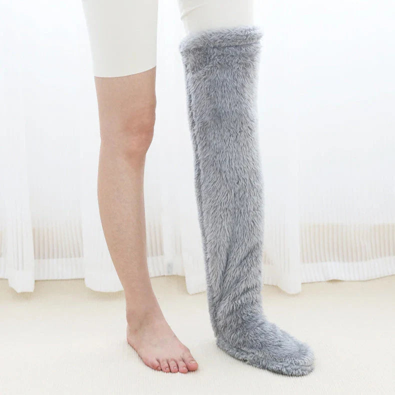 Cozy over-the-knee fuzzy socks in a variety of colors for winter warmth and comfort