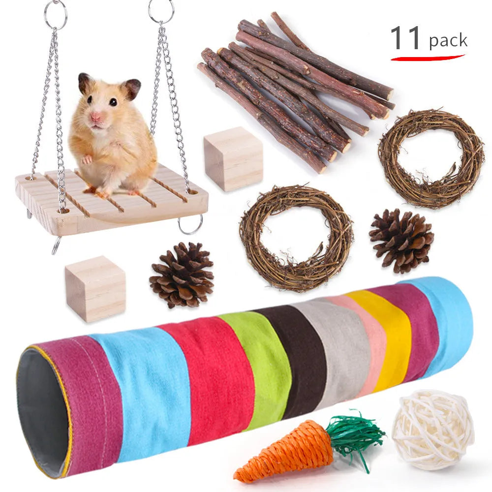 Assorted natural wooden chew toys for small pets including balls, rings, and mats on a plain background.