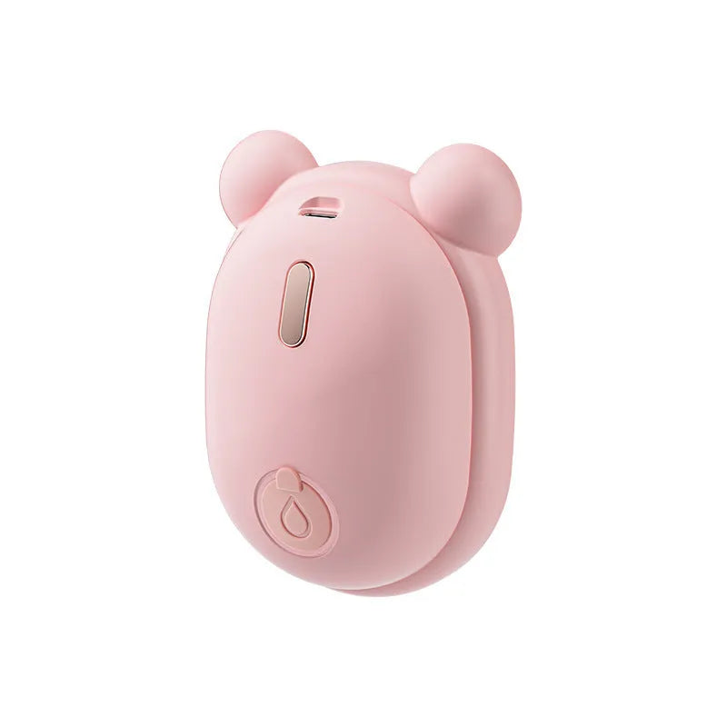 Pink and yellow rechargeable pet grooming comb with detachable head and spray function.