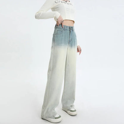 Women's gradient blue denim straight-leg trousers with 100% cotton fabric, showing colour transition and straight-leg silhouette