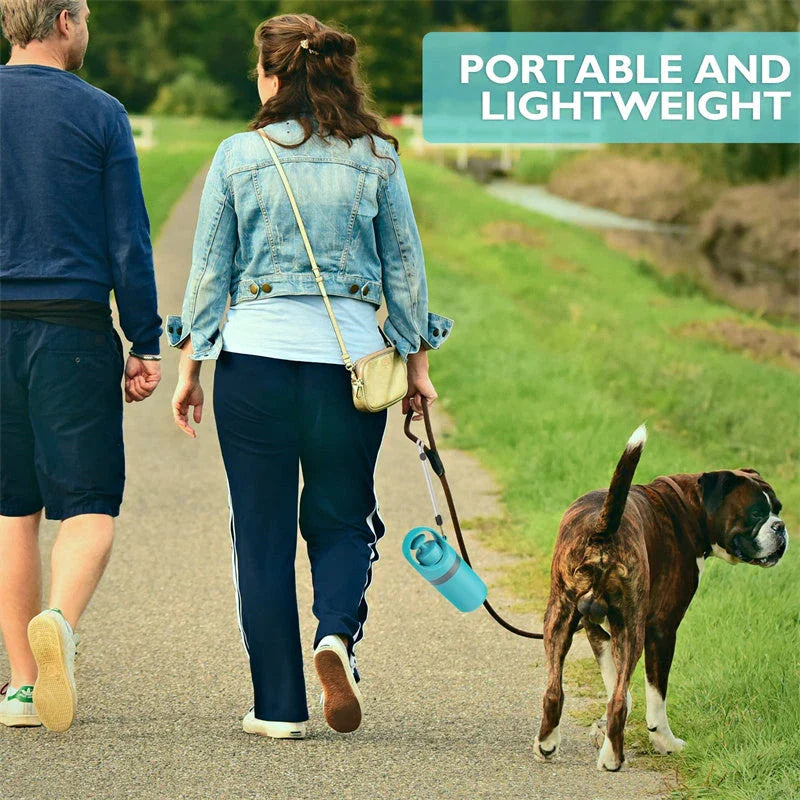 Portable dog poop scooper with claw mechanism and built-in bag dispenser for effortless pet waste cleanup