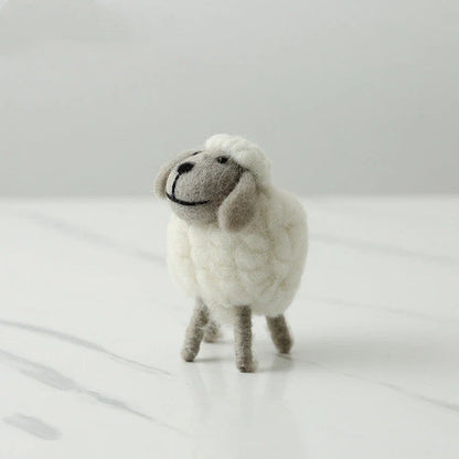 Plush sheep figurines in various colors and sizes, perfect for home decoration and gifting
