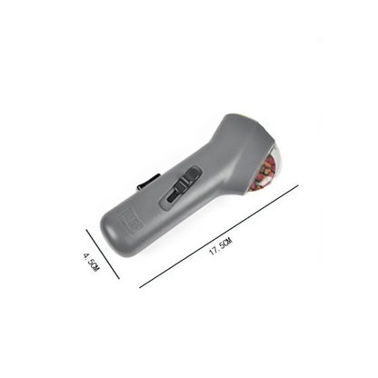 Grey-coloured pet treat catapult launcher for dogs and cats on a plain background.
