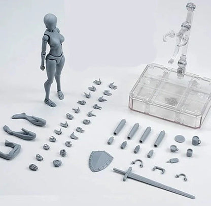 Articulated artist mannequin kit with interchangeable hands and accessories