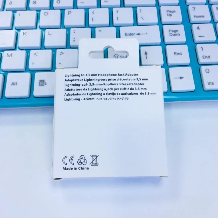 White Lightning to 3.5mm headphone adapter for iPhone 7, 6, and 6S models.