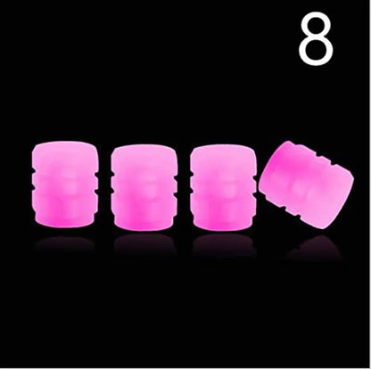 Glow-in-the-dark rubber tyre valve caps in five colour options on tyre valve stem