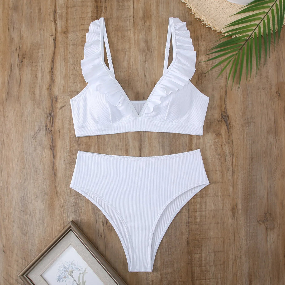 Women's retro striped split chest bikini swimsuit on a hanger