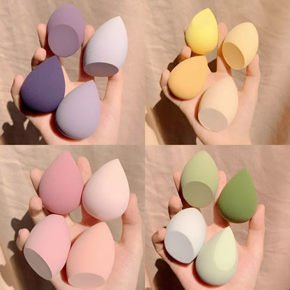 Four colourful synthetic makeup sponge eggs in a box, each measuring 6 cm.