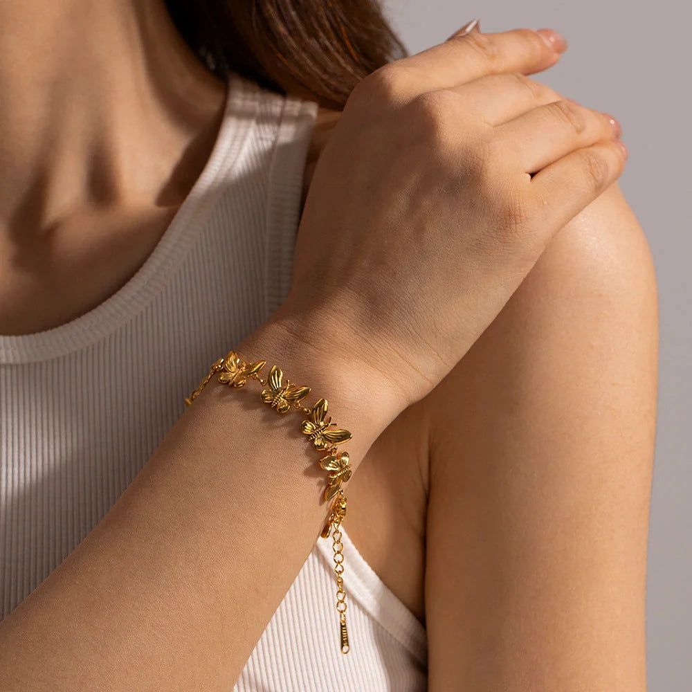 Elegant stainless steel bracelet with delicate butterfly design, available in a variety of fashionable colours