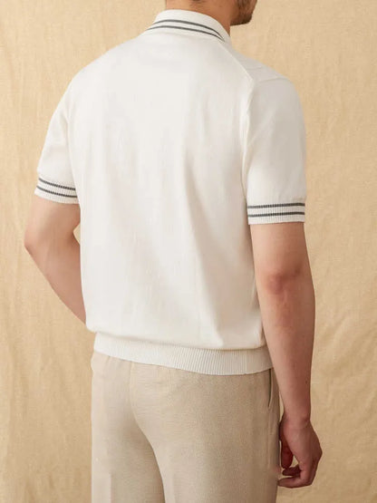 Men's apricot-coloured short-sleeved polo shirt with a lapel collar, laid flat.