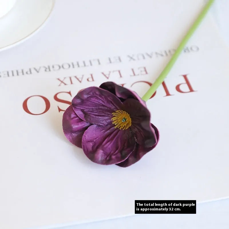 Pack of 15 mini artificial poppy flowers in assorted colours including purple, pink, yellow and red.