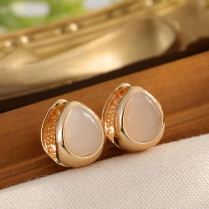 Cat's eye stone water drip ear buckle earrings in gold or silver colour, retro niche design for women.
