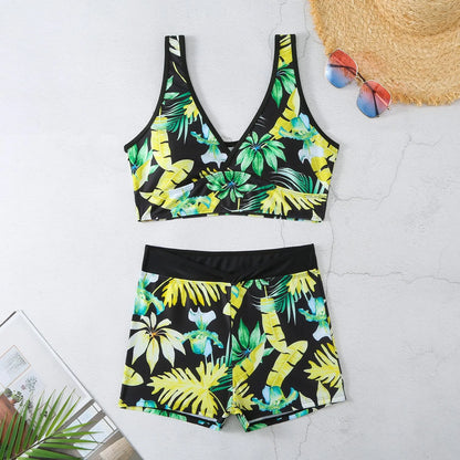 Women's two-piece swimsuit set showing sleeveless bikini top and printed boxer-style briefs in a multi-colour pattern.
