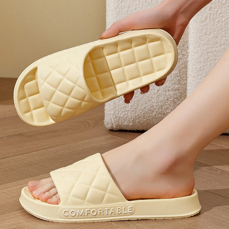 Stylish plaid slippers with soft, cushioned soles for comfortable indoor wear