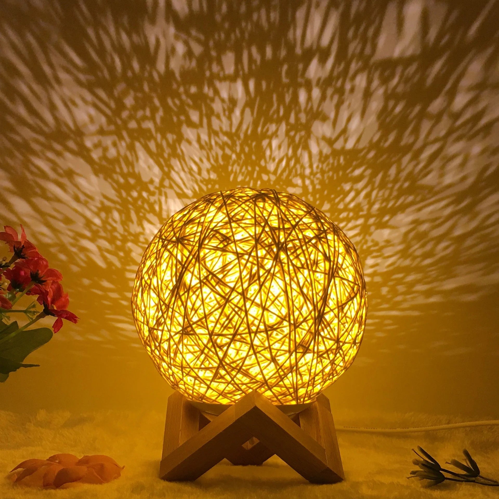 LED rattan table lamp with hand-knit linen shade in various colours