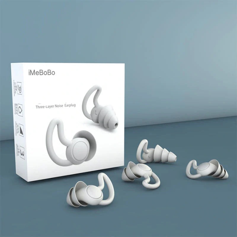 Soft, flexible silicone earplugs in grey and black colours, designed to block out disruptive sounds for a peaceful night's sleep