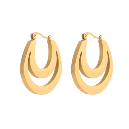 Geometric French earrings with gold plating and round ring design elements