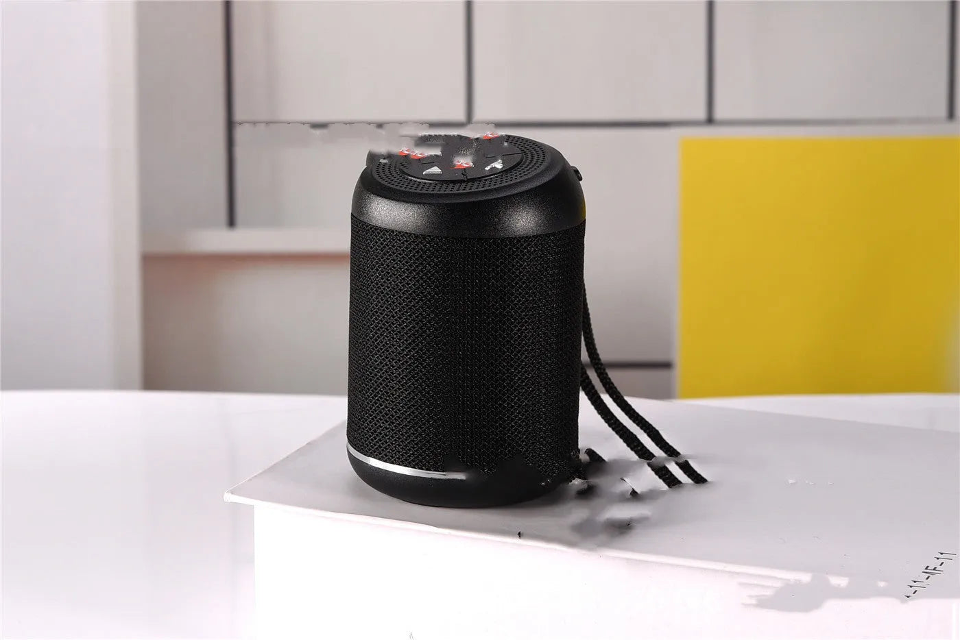Portable outdoor Bluetooth subwoofer in multiple colours with radio and call functions.