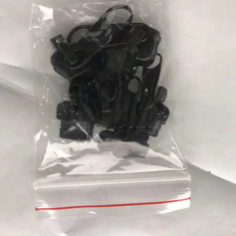 12-piece zipper head replacement kit in black, grey, and brown colours with snap-on installation
