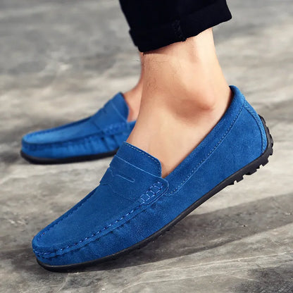 Men's suede casual loafers in brown with a round toe and rubber sole, shown in a UK plus size.