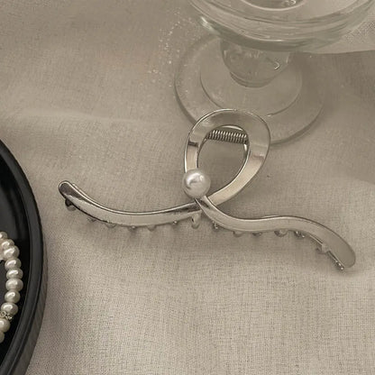Silver metal hair claw barrette example from a range of 44 Korean-style designs.