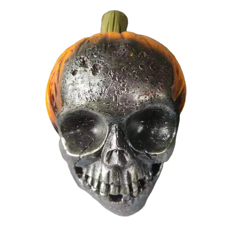Hand-painted pumpkin skull resin ornament measuring 12cm tall with orange and black colour scheme