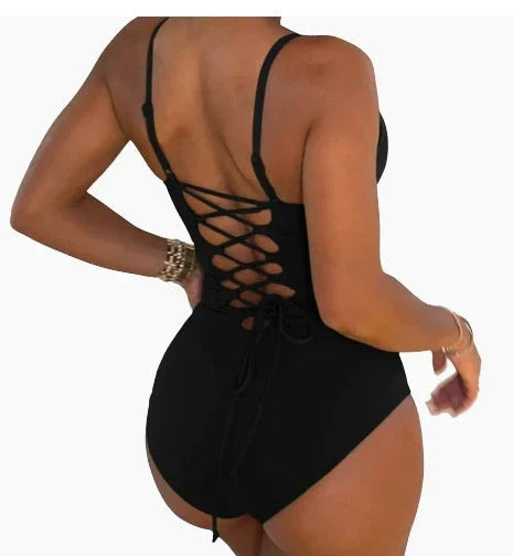 A stylish, backless one-piece swimsuit in a variety of vibrant colors for women's summer fashion.