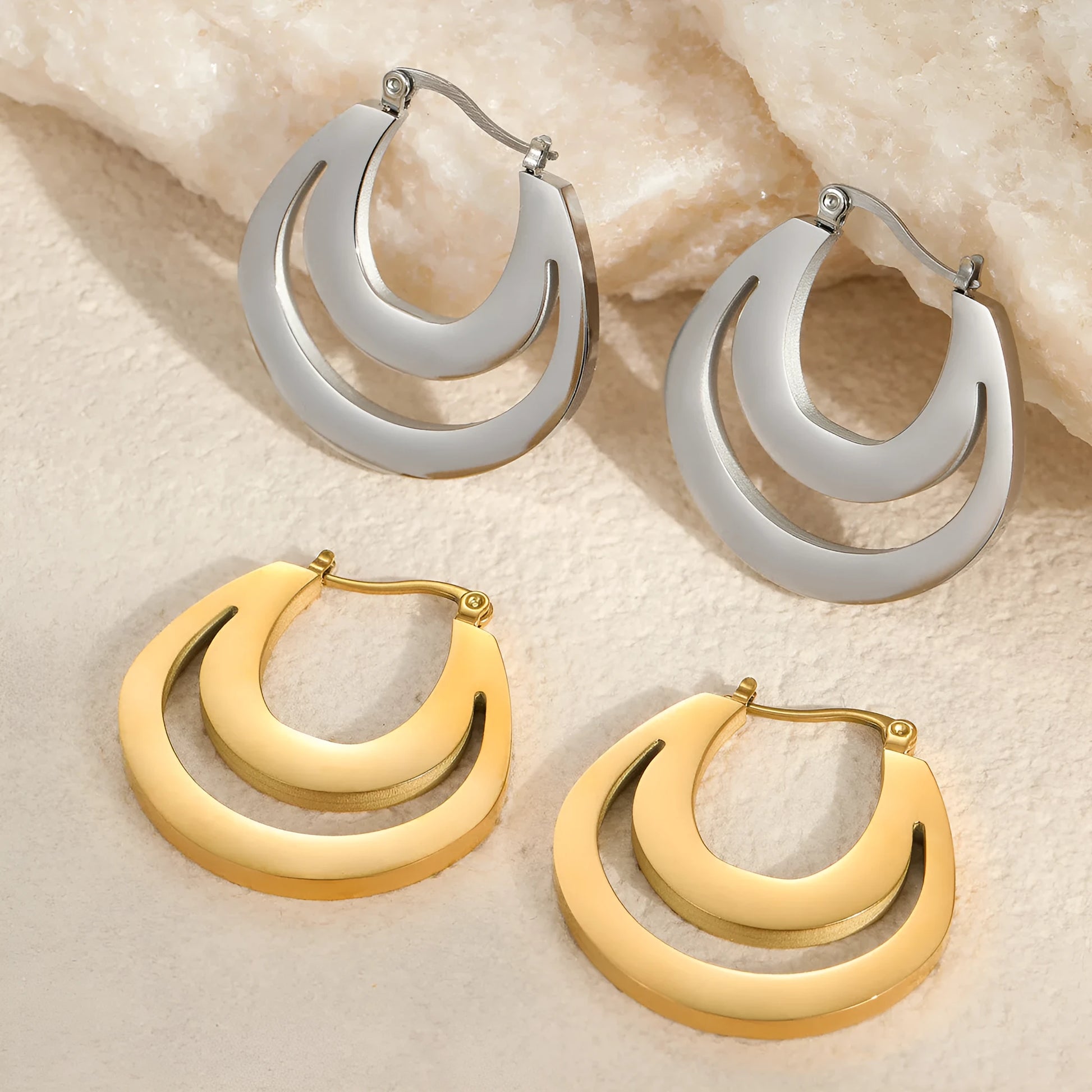 Geometric French earrings with gold plating and round ring design elements