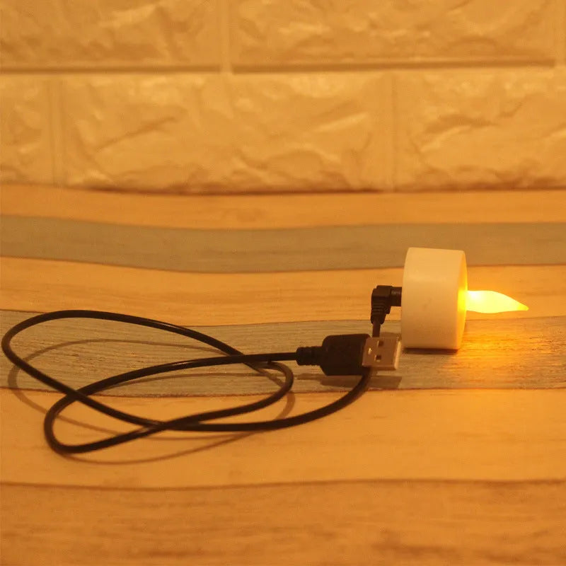 White plastic USB rechargeable LED candle with yellow flashing light mode, measuring 5.5cm tall