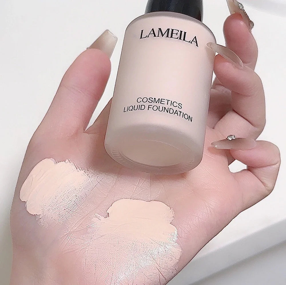 Moisturising concealer foundation bottle showing liquid texture with four shade options for skin tone correction